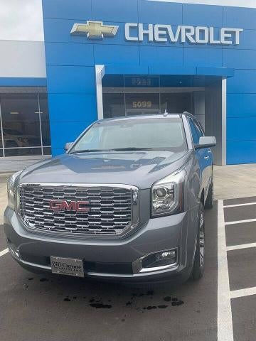 2019 GMC Yukon Denali in Satin Steel Metallic — front three-quarter view