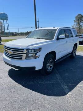 2018 Chevrolet Tahoe LS Custom Edition in Summit White — front three-quarter view