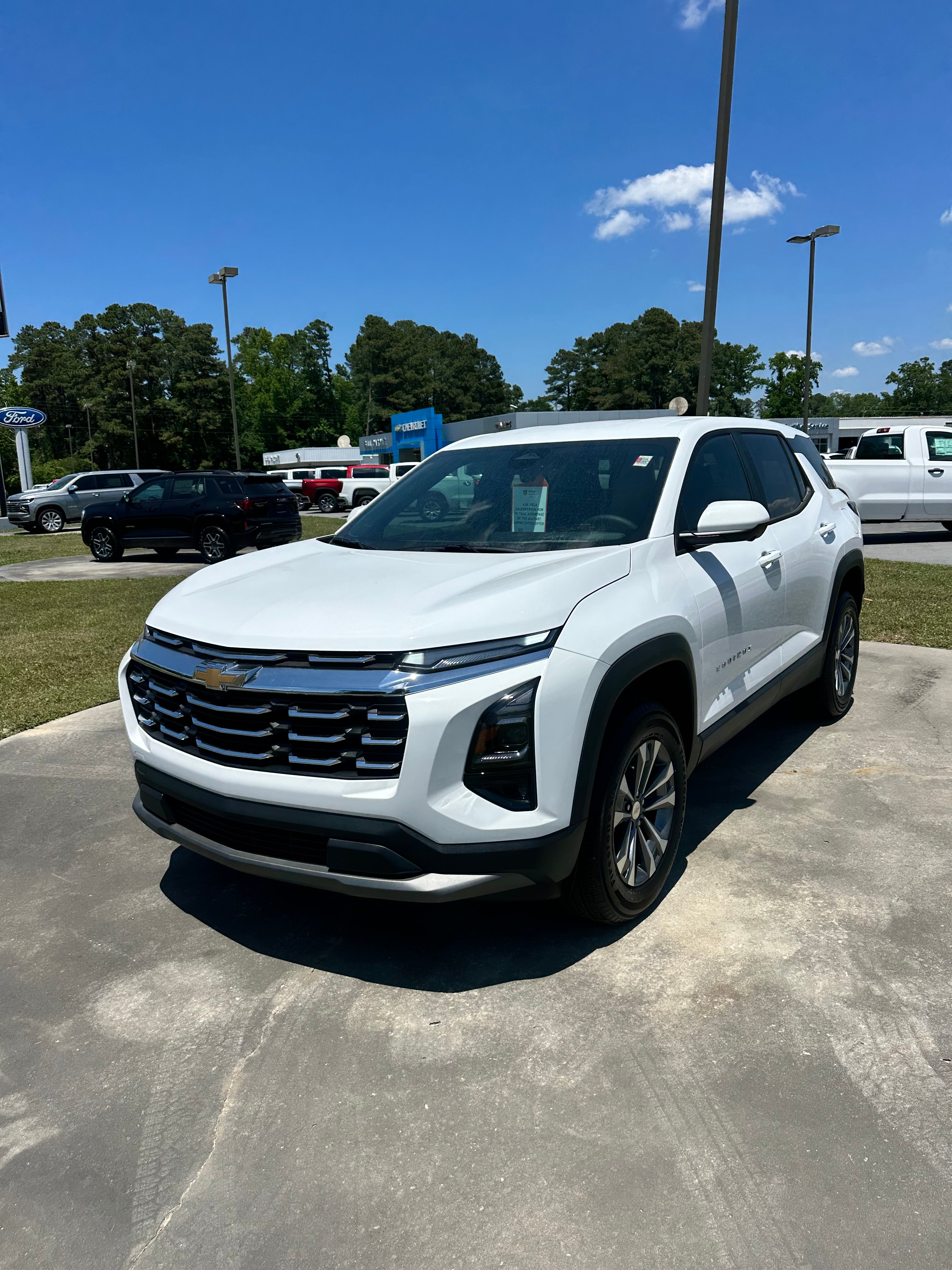2026 Chevrolet Equinox LT in Summit White — front three-quarter view
