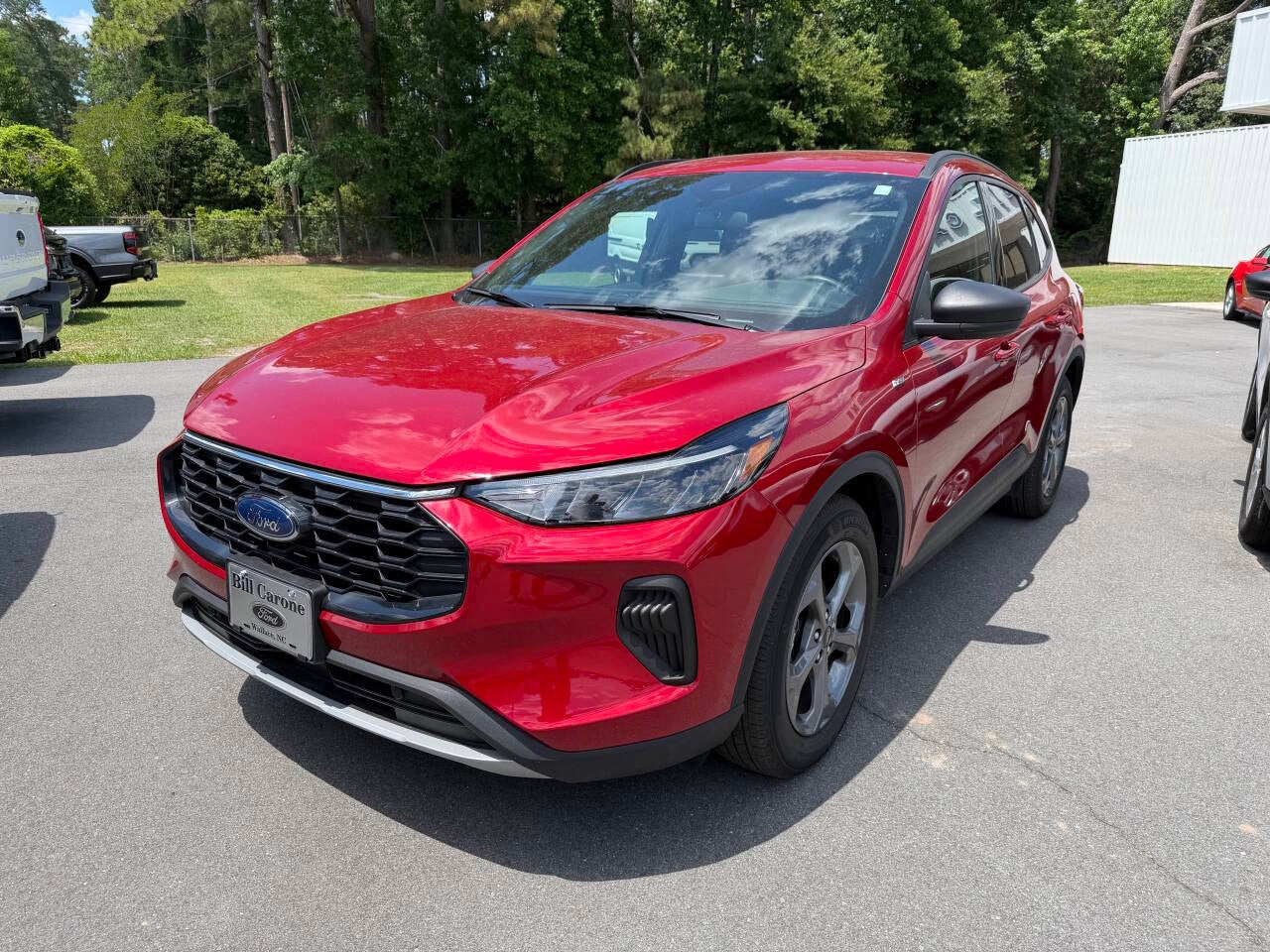 2025 Ford Escape ST Line 4dr SUV in Red — front three-quarter view