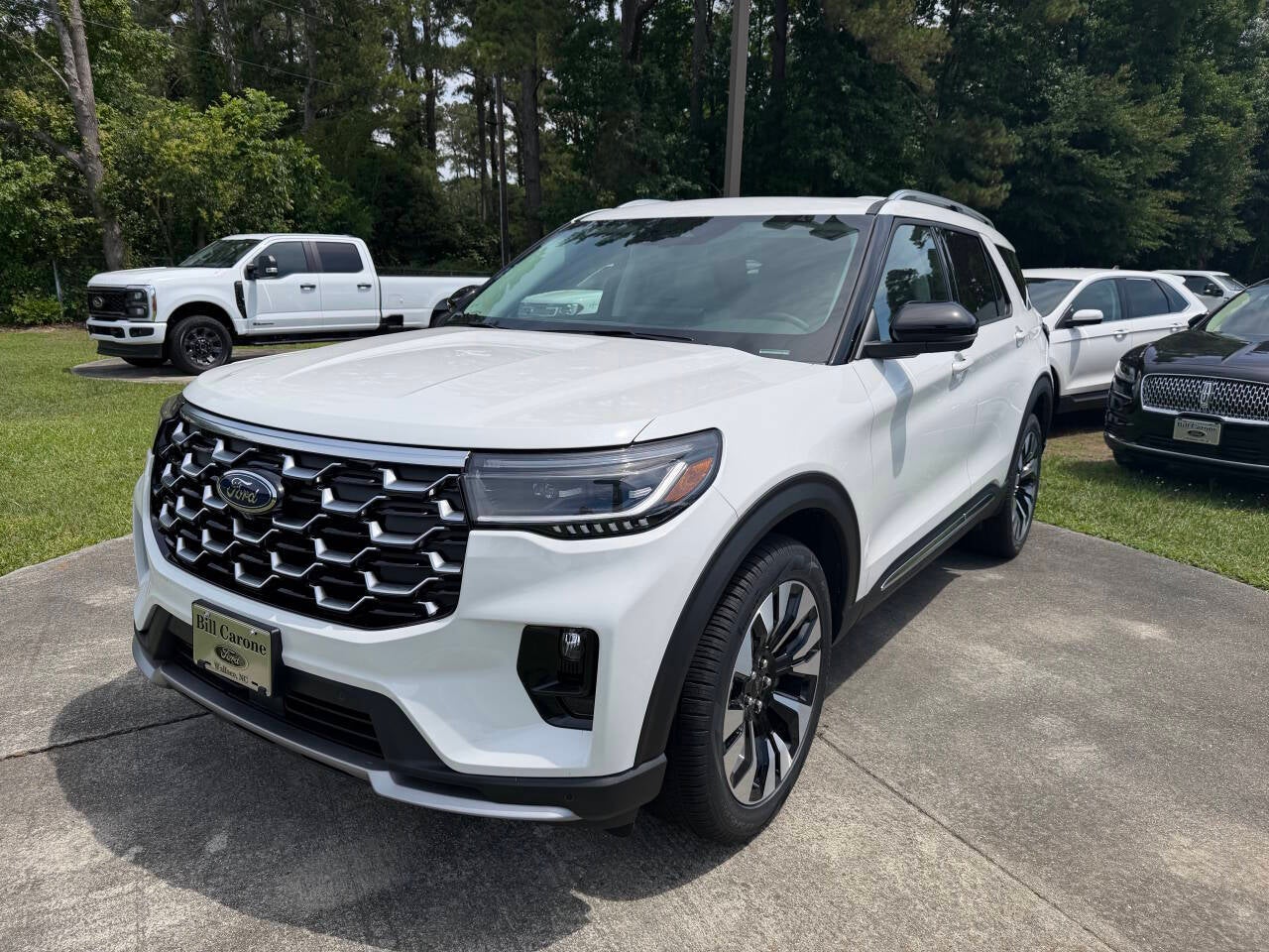 2026 Ford Explorer Platinum AWD 4dr SUV in Star White — front three-quarter view