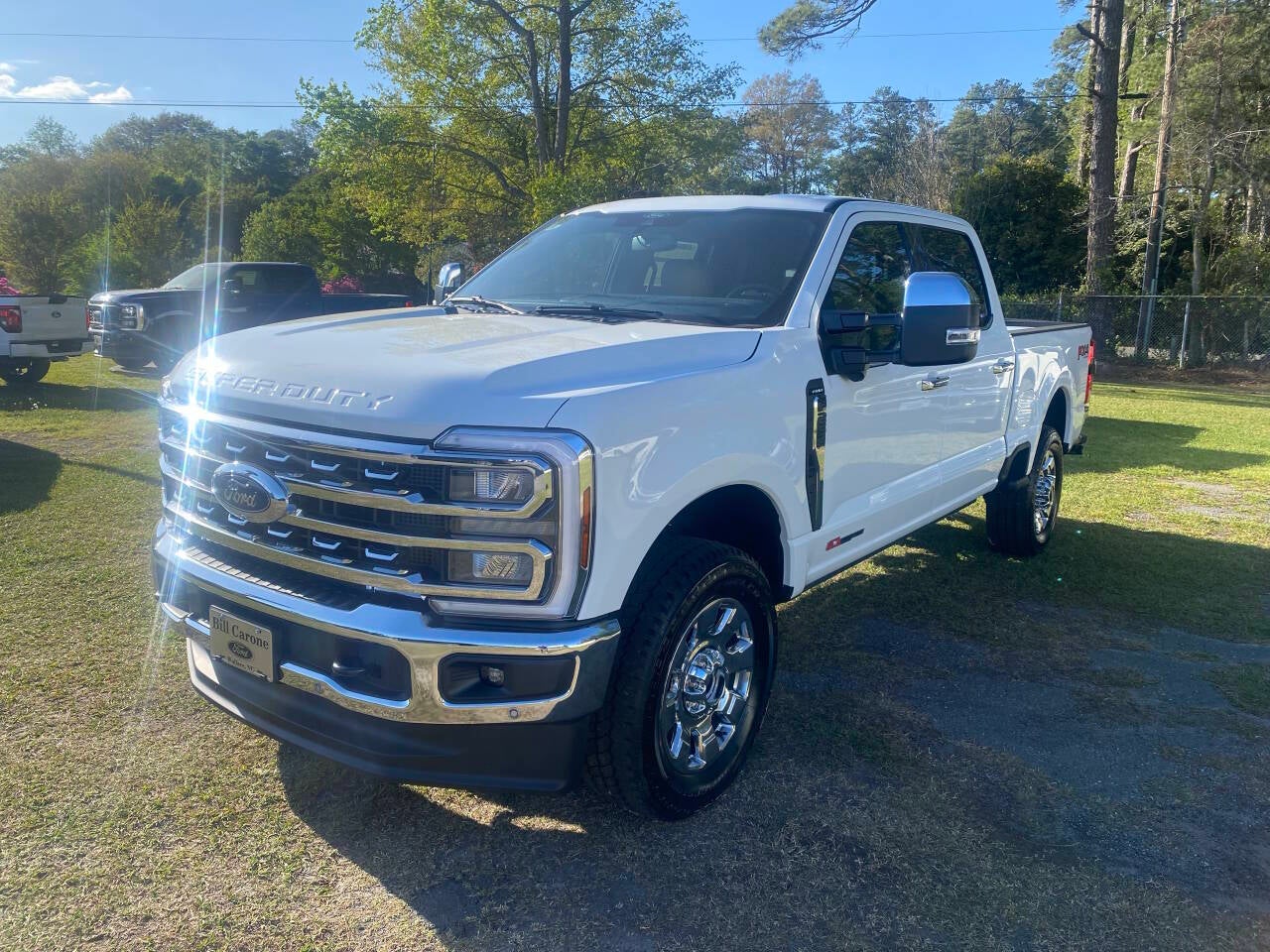 2026 Ford F-250 Super Duty Lariat 4x4 4dr Crew Cab 6.8 ft. SB Pickup in Oxford White — front three-quarter view