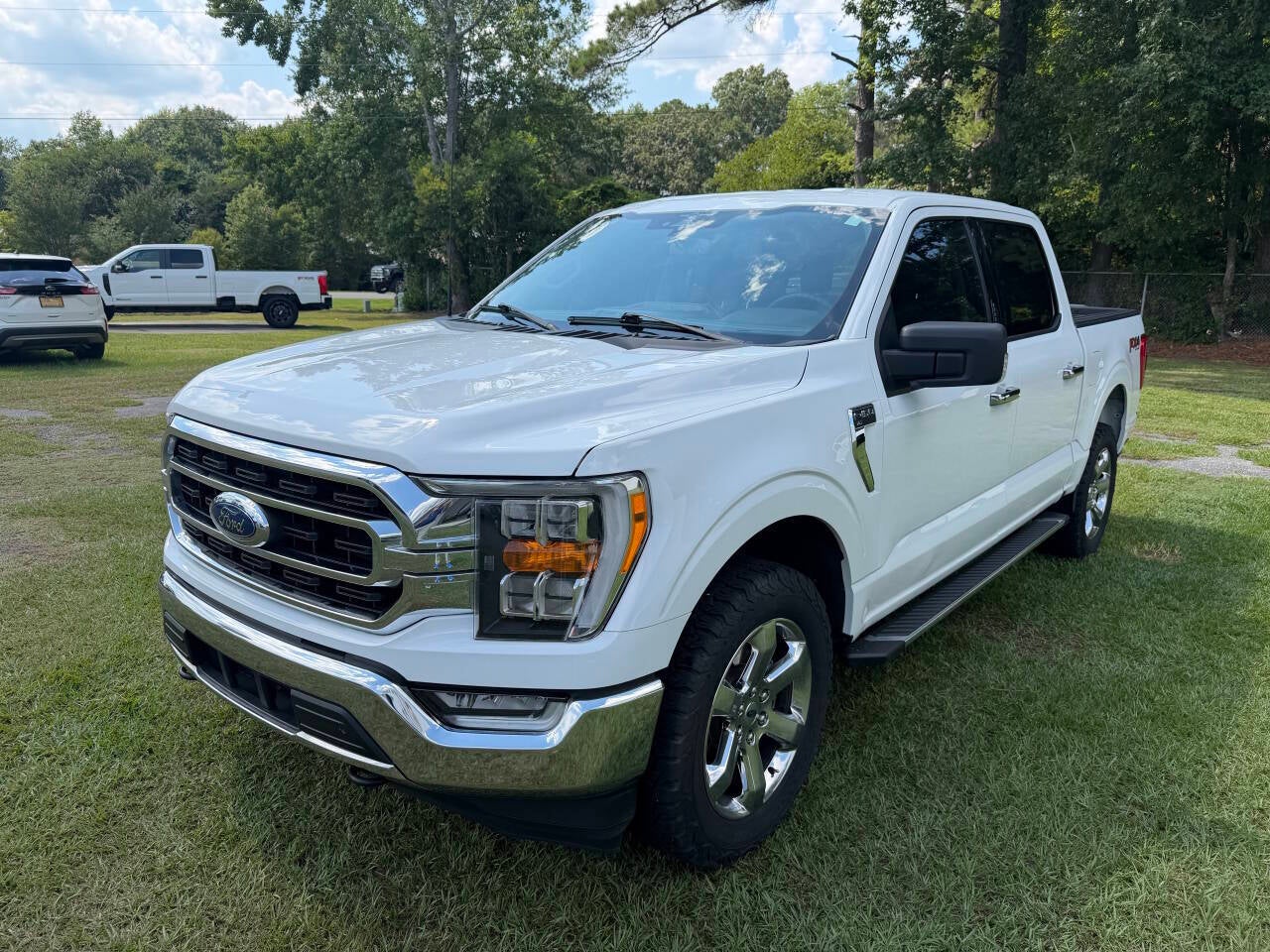 2023 Ford F-150 XLT 4x4 4dr SuperCrew 5.5 ft. SB in White — front three-quarter view