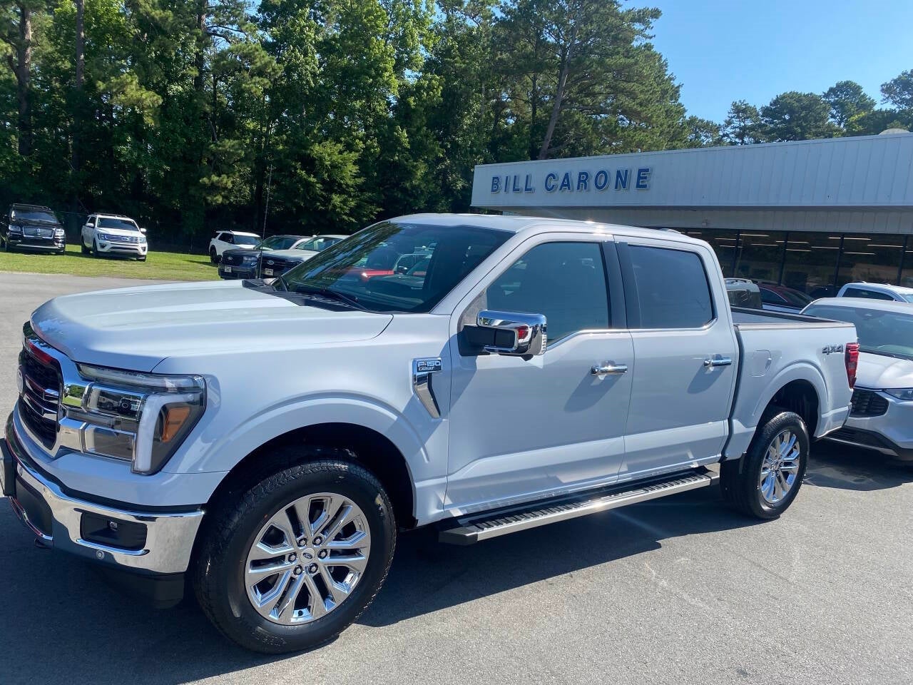2025 Ford F-150 Lariat 4x4 4dr SuperCrew 5.5 ft. SB in Space White — front three-quarter view